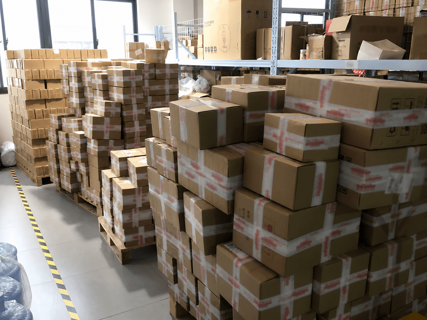 Packed inventory organized on warehouse pallets